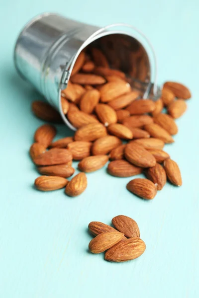 Almonds in bucket — Stock Photo, Image
