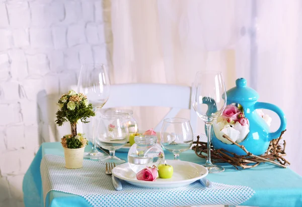 Beautiful holiday Easter table setting in blue tones, on light background — Stock Photo, Image
