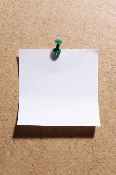 Prázdný papír list na dřevěné pozadí — Stock fotografie