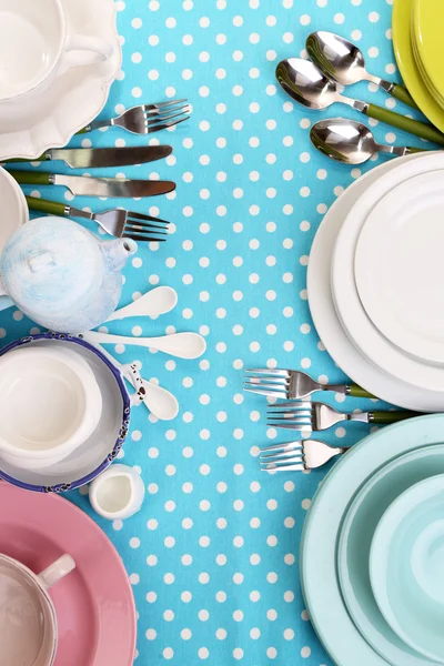 Different tableware on tablecloth — Stock Photo, Image