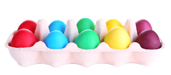 Colorful Easter eggs in tray isolated on white — Stock Photo, Image