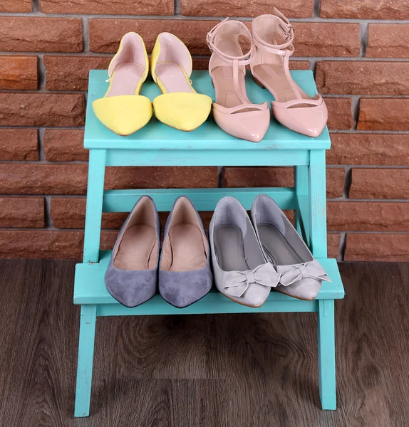 Shoe shelf with women shoes — Stock Photo, Image