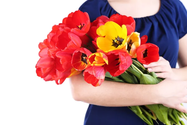 Tulipas coloridas em mãos femininas isoladas em branco — Fotografia de Stock