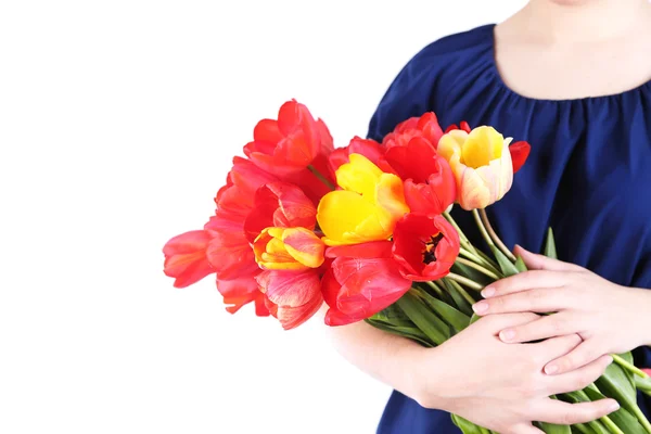 Kleurrijke tulpen in vrouwelijke handen geïsoleerd op wit — Stockfoto