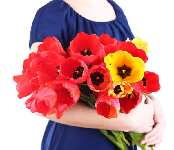 Bunte Tulpen in weiblichen Händen isoliert auf weiß — Stockfoto