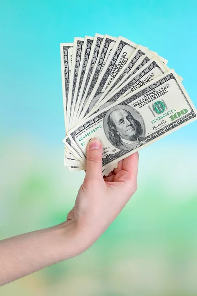 Dólares na mão — Fotografia de Stock