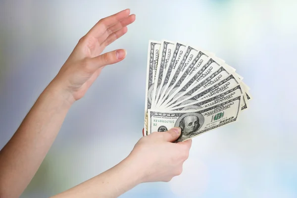 Dollars in hands — Stock Photo, Image
