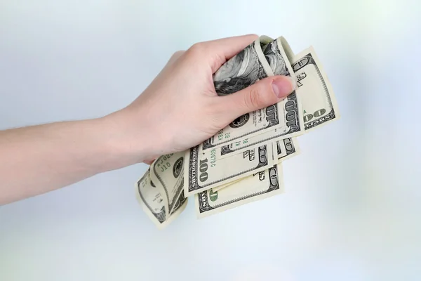 Dolarů v ruce — Stock fotografie