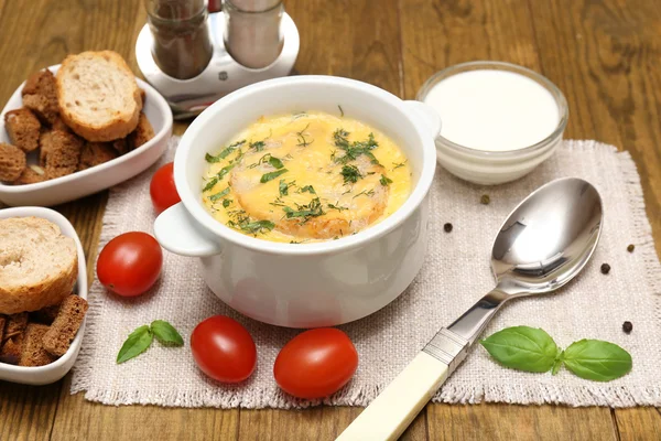 Tasty soup in saucepan — Stock Photo, Image