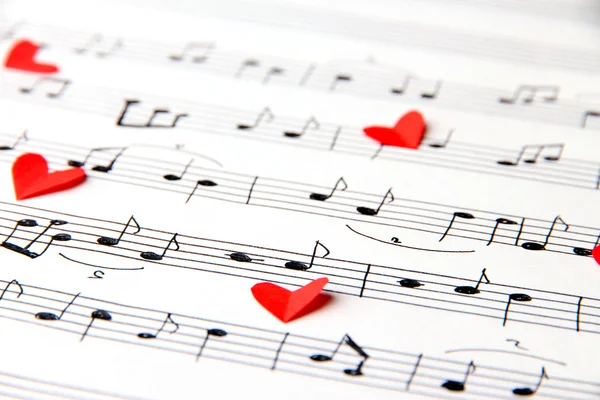 Paper hearts on music book — Stock Photo, Image