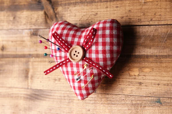 Fabric heart with color pins — Stock Photo, Image