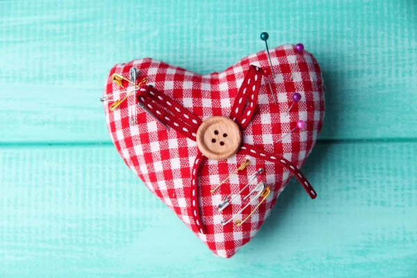 Fabric heart with color pins — Stock Photo, Image