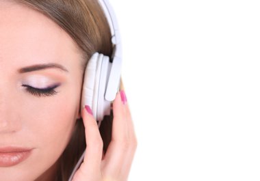 genç kız üzerinde beyaz izole müzik dinlemek