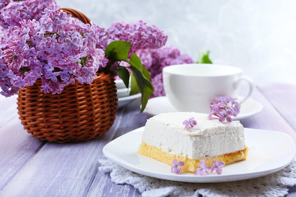 Dessert with lilac flowers