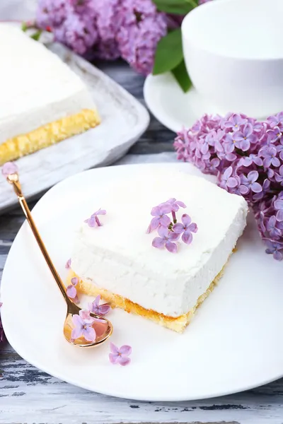 Dessert with lilac flowers