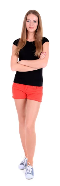 Beautiful young girl in shorts and t-shirt isolated on white — Stock Photo, Image