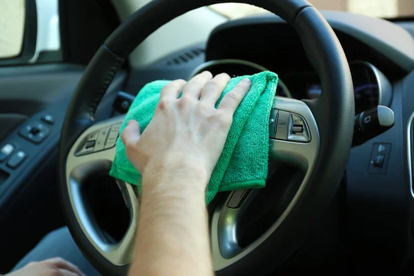 Hand with microfiber cloth polishing car — Stock Photo, Image