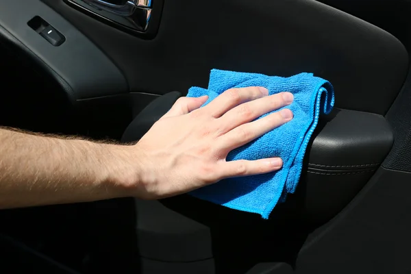 Hand with microfiber cloth polishing car — Stock Photo, Image