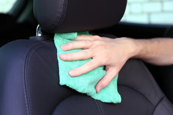 Hand with microfiber cloth polishing car — Stock Photo, Image