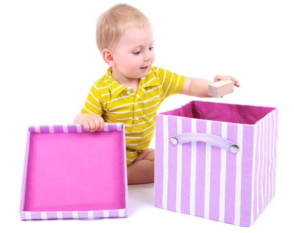 Söt liten pojke med textil box isolerad på vit — Stockfoto