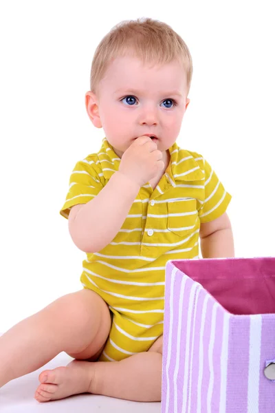 Niedliche kleine Junge mit Textilbox isoliert auf weiß — Stockfoto