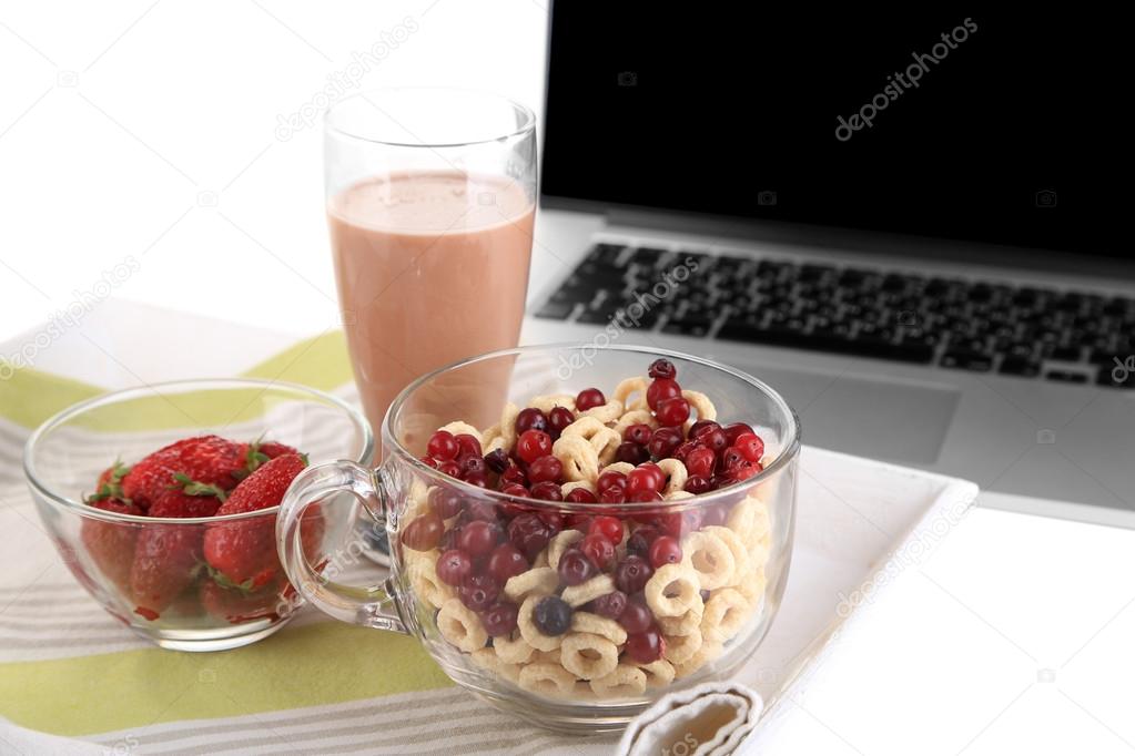 Laptop and healthy breakfast