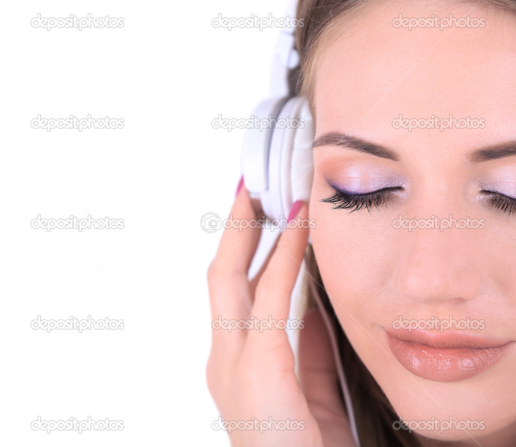 Young girl listen to music  isolated on white