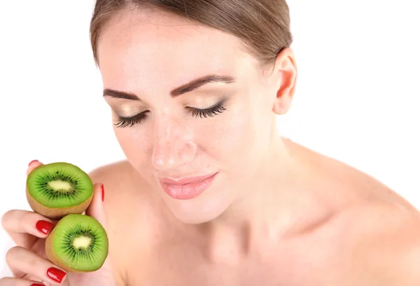 Beautiful young woman holding kiwi fruit, isolated on white — Stock Photo, Image