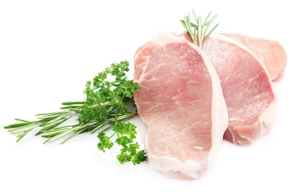 Nyers hús steak gyógynövények elszigetelt fehér — Stock Fotó