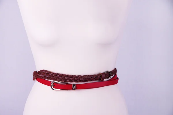 Straps on mannequin on grey background close-up — Stock Photo, Image