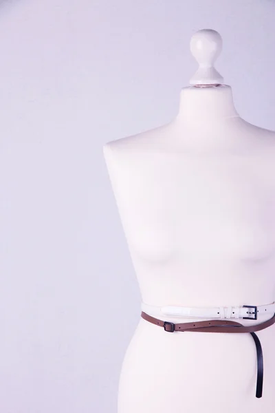 Straps on mannequin on grey background close-up — Stock Photo, Image