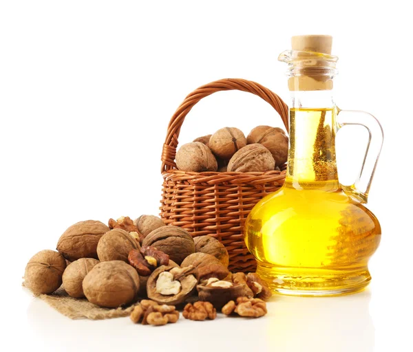 Walnut oil and nuts, isolated on white — Stock Photo, Image