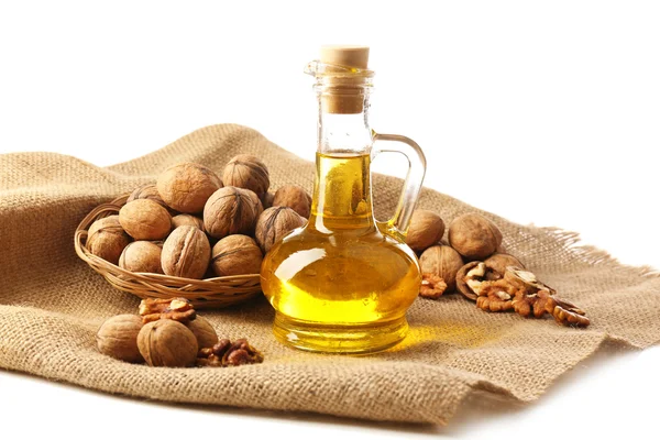 Walnut oil and nuts, isolated on white — Stock Photo, Image