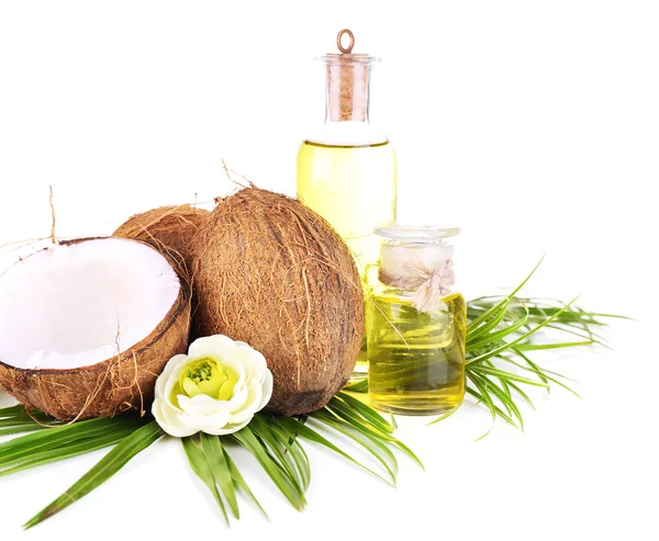 Cocos y aceite de coco, aislados sobre blanco — Foto de Stock