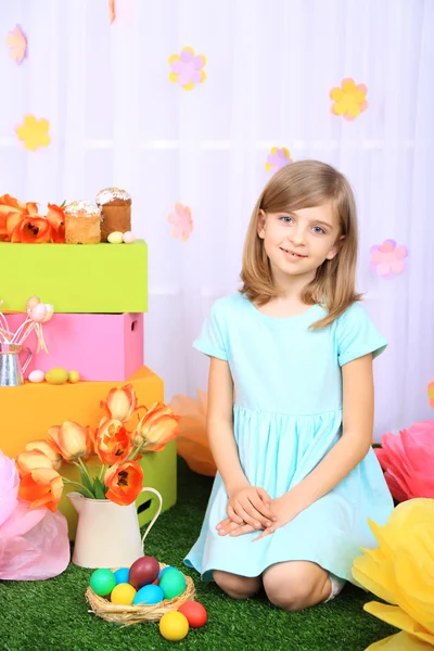 Beautiful small girl on decorative background — Stock Photo, Image