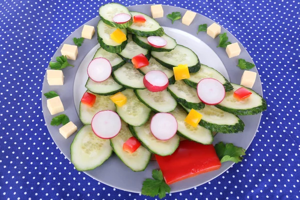 Christmas tree from cucumber on plate on table close-up — Stock Photo, Image