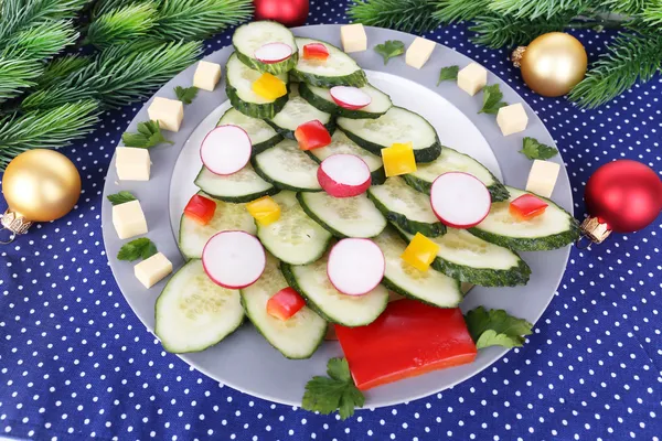 Christmas tree from cucumber on plate on table close-up — Stock Photo, Image