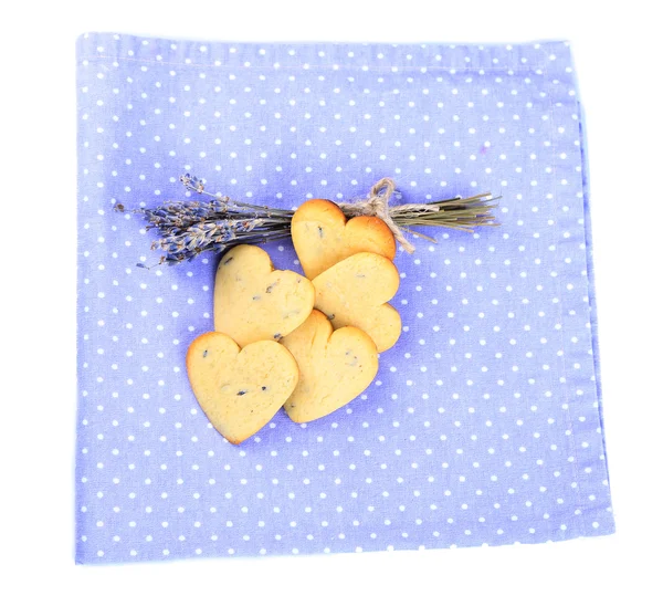 Biscuits à la lavande sur serviette de couleur, isolés sur blanc — Photo