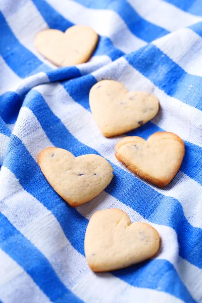 Galletas de lavanda sobre fondo de servilleta de color — Foto de Stock