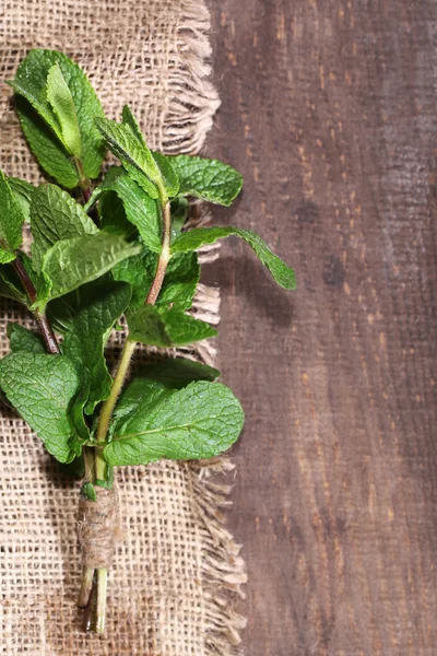 Mint on wooden background — Stock Photo, Image