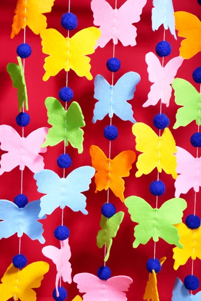 Handgemaakte garland op kleur achtergrond — Stockfoto