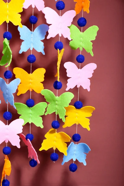 Handgemaakte garland op kleur achtergrond — Stockfoto