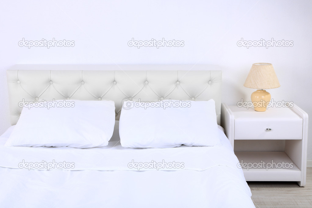 Comfortable soft bed in room