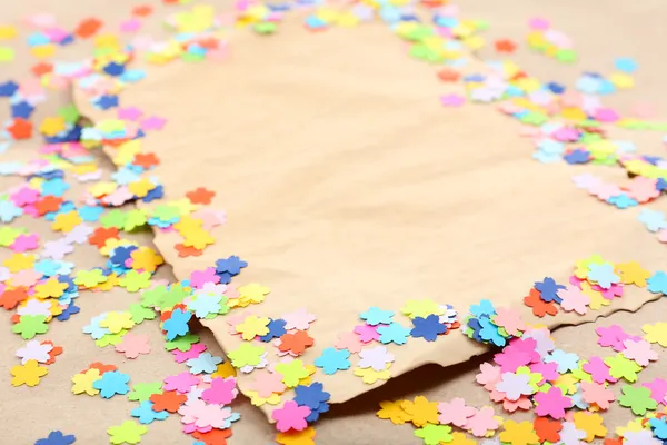 Cadre confetti sur vieux papier — Photo