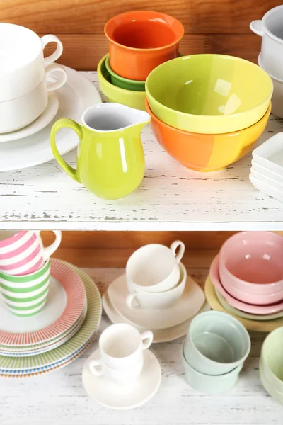 Different tableware on shelf, on wooden background — Stock Photo, Image