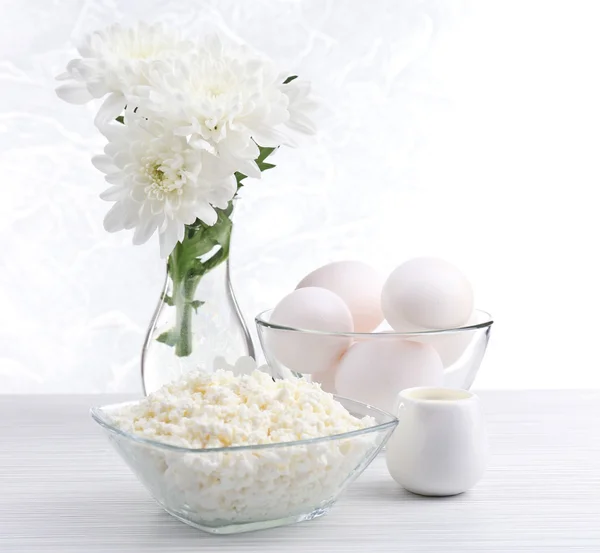 Tasty dairy products on wooden table — Stock Photo, Image