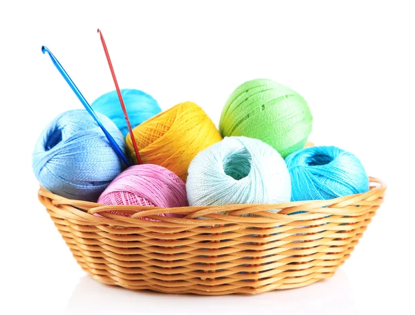 Colorful yarn for knitting in wicker basket and crochet hook, isolated on white — Stock Photo, Image