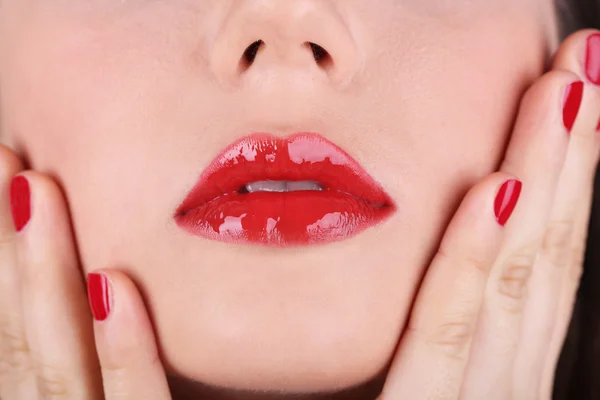 Red lips and nails closeup Royalty Free Stock Images