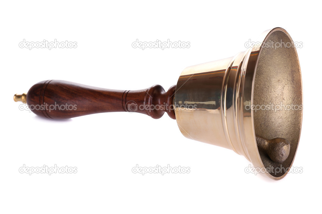 Gold retro school bell isolated on white