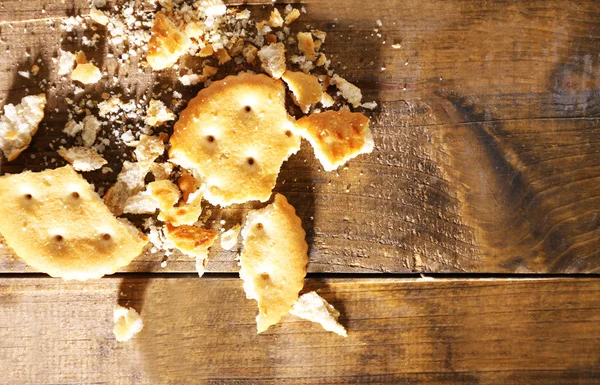 Crushed cookie on wooden background — Stock Photo, Image